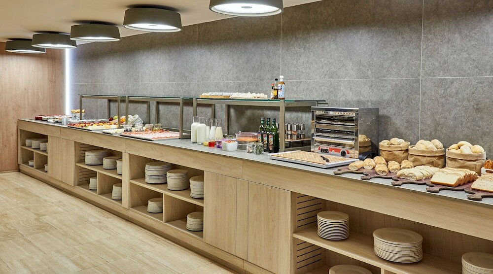 Фото Отель Nh Las Palmas Playa las Canteras