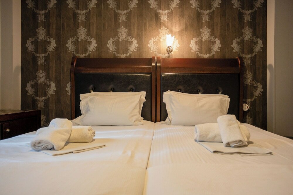 Фото Toti Boutique Rooms