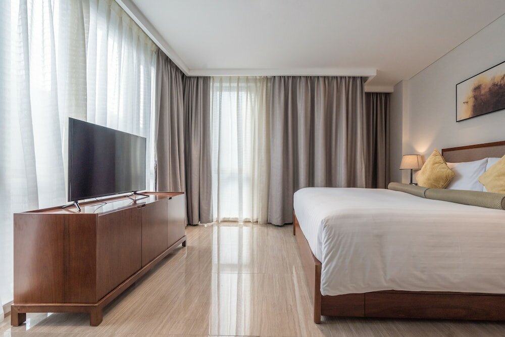 Фото Oakwood Hotel & Residence Suzhou