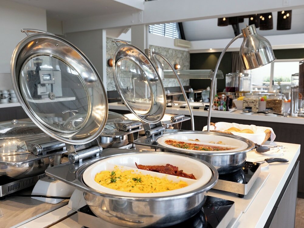 Фото Auckland Rose Park Hotel