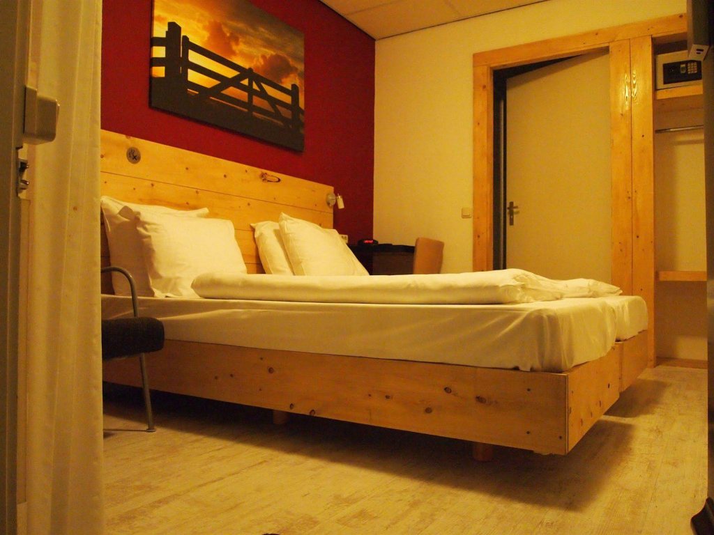 Фото Hotel De Stadsherberg