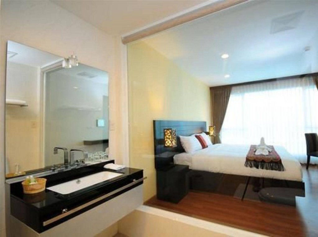 Фото Boss Suites Nana Hotel