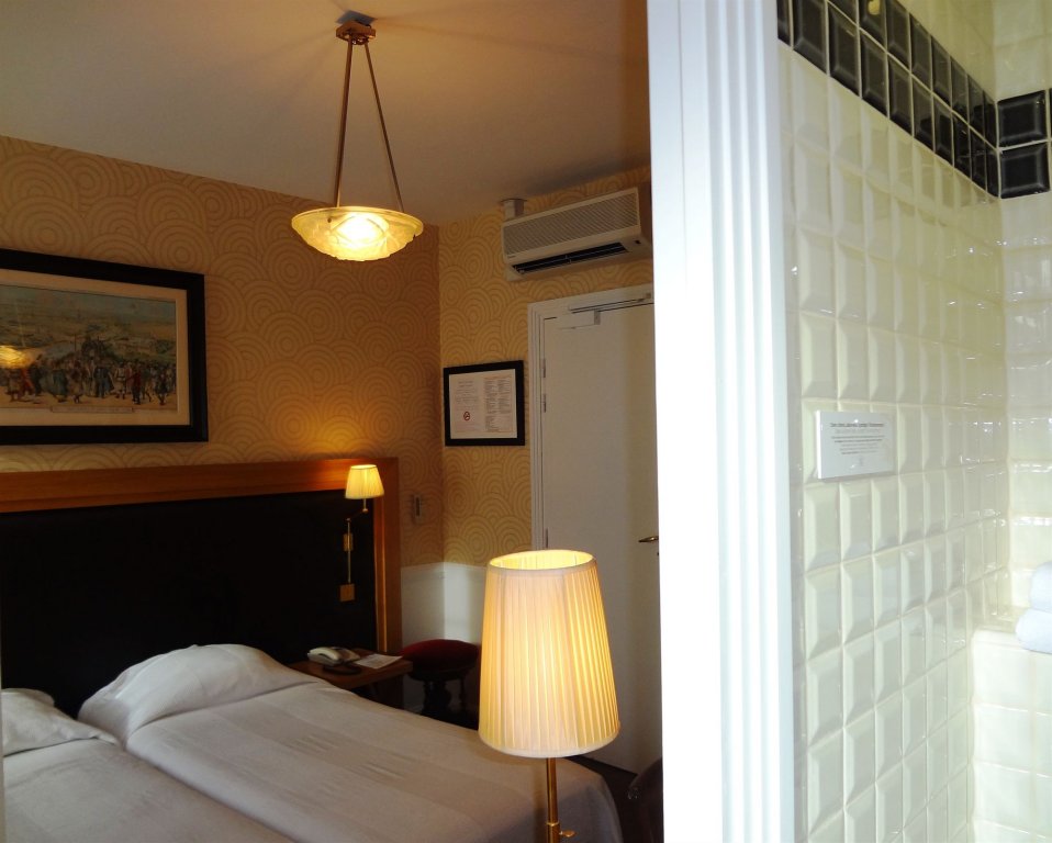 Фото Hôtel Le Cercle Tour Eiffel