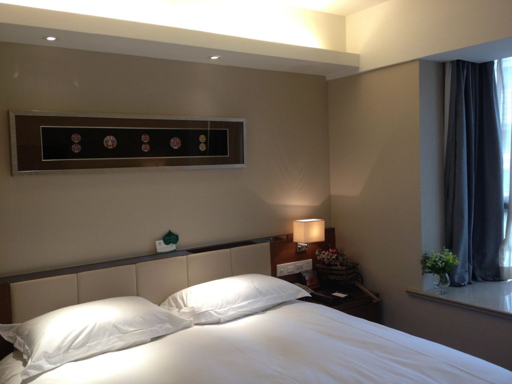 Фото Yiwu Wendemu International Hotel