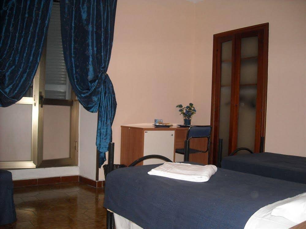 Фото B&t Rooms Trani