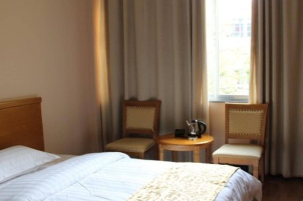 Фото Kunming Xinhua International Resort Hotel&Spa