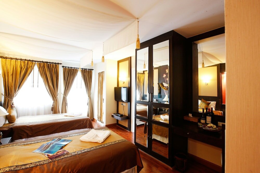 Фото Mirth Sathorn Hotel