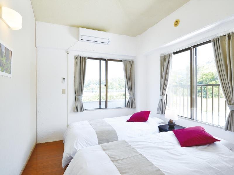 Фото Kariyushi Condominium Resort Onna Maeda Base