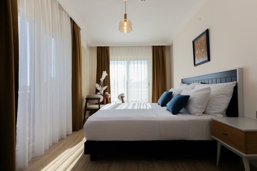 Гостиница Kamer Exclusive Hotel & Suites в Чешме