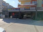Halikarnas Oto Lastik (İzmir, Karşıyaka, Bahriye Üçok Mah., Atatürk Blv., 33B) ، تركيب وتصليح الإطارات