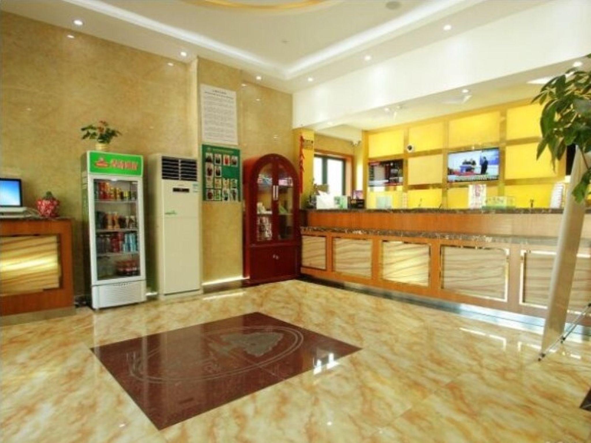 Фото GreenTree Inn ShangHai BaoShan 128 Memorial Road TongHe Road Shell Hotel