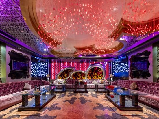 Фото Auden International Hotel