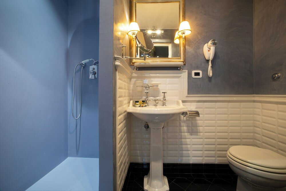 Фото Boutique B&b Torre De' Conti