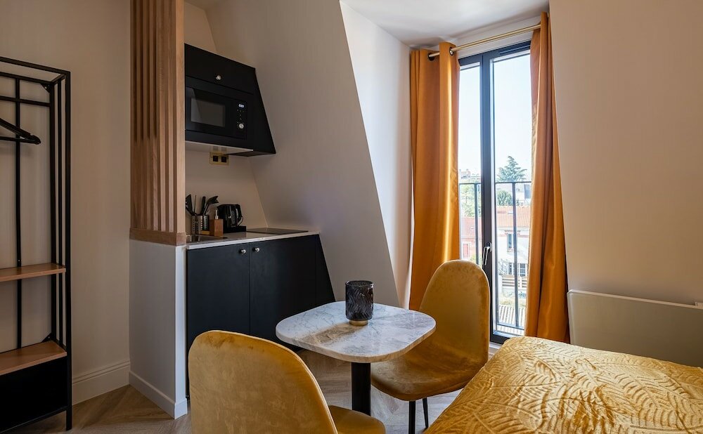 Фото Mijo's Appartements Hôtel