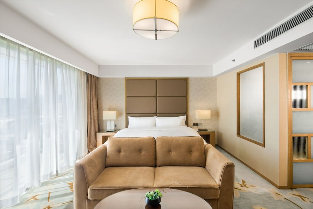 Фото Shenzhen New World Metro Grand Hotel