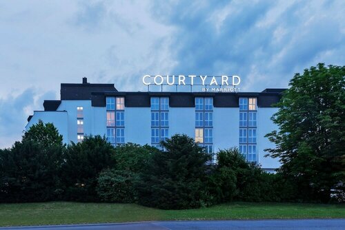 Внешний вид отеля Courtyard by Marriott Wiesbaden-Nordenstadt в Висбадене, фото 4