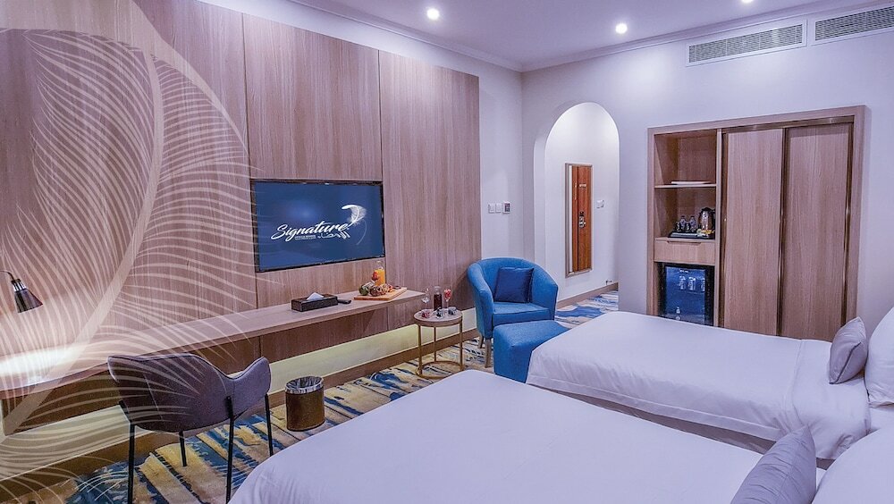 Фото Signature Hotel