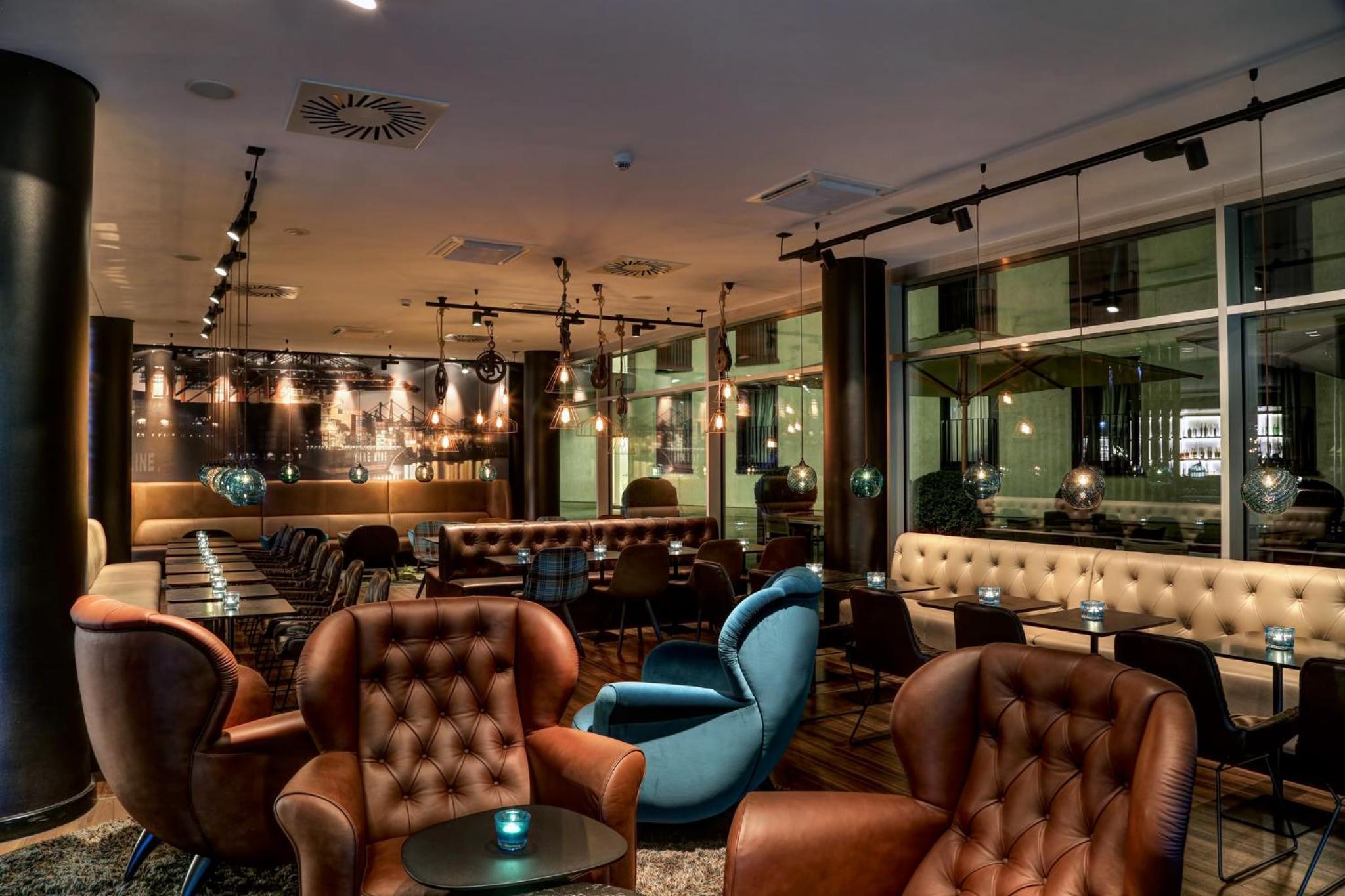 Фото Motel One Hamburg am Michel