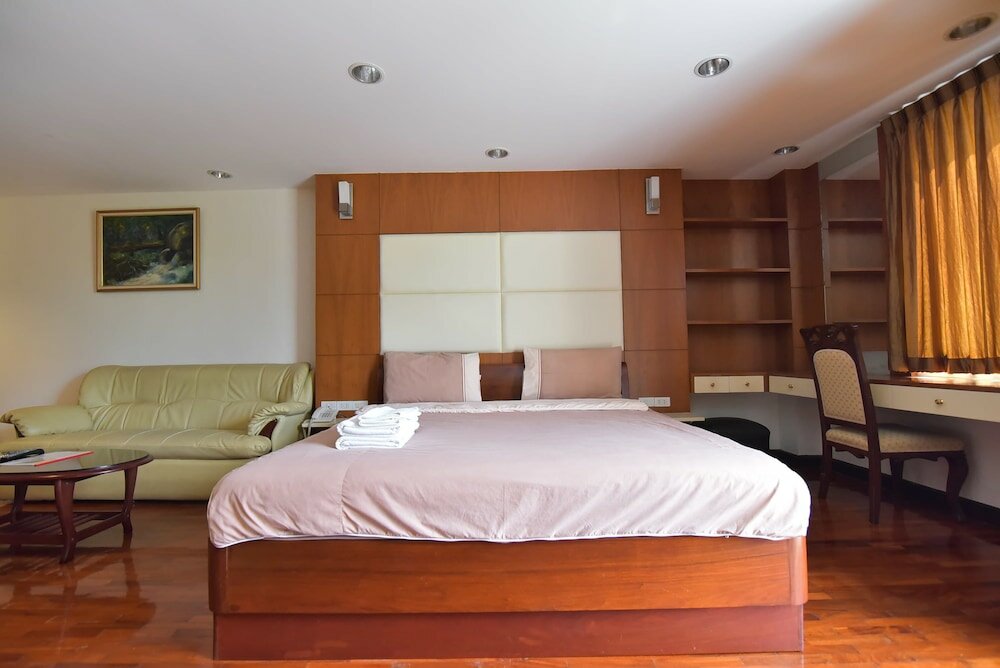 Фото Eight Ville Apartment
