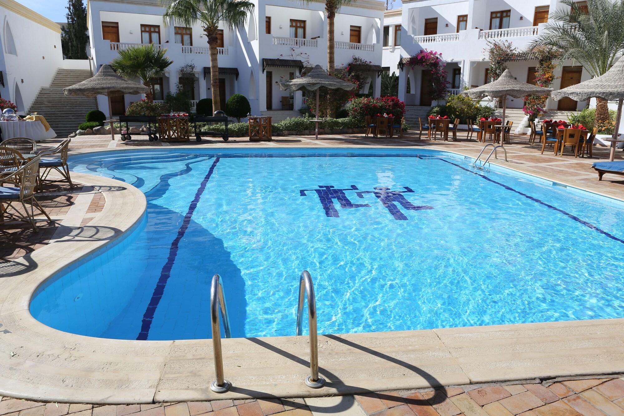 Фото Club Reef Resort