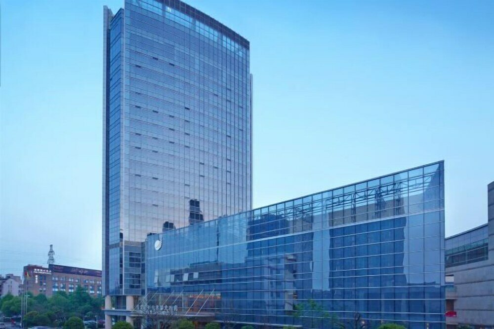 Фото Grand New Century Hotel Fuyang