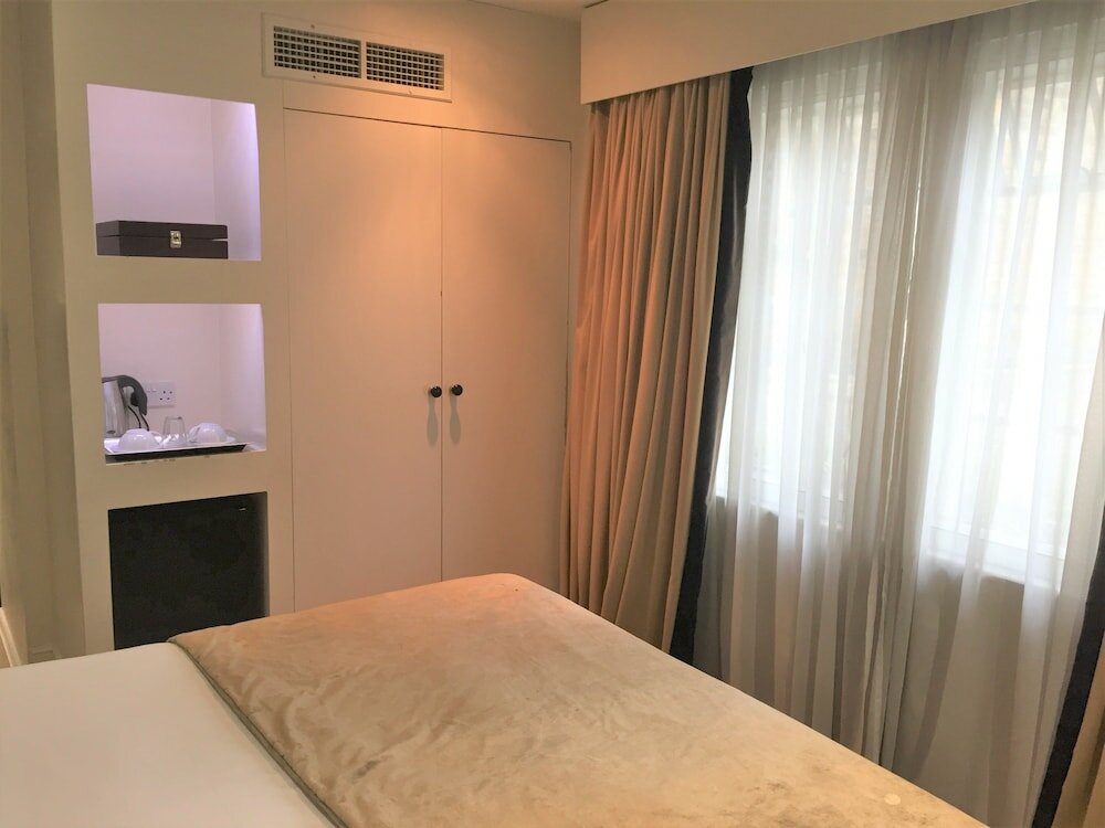 Фото Tophams Hotel