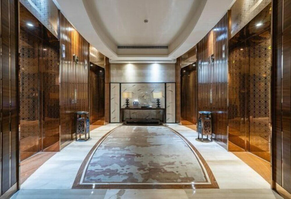 Фото Grand New Century Hotel Fuyang