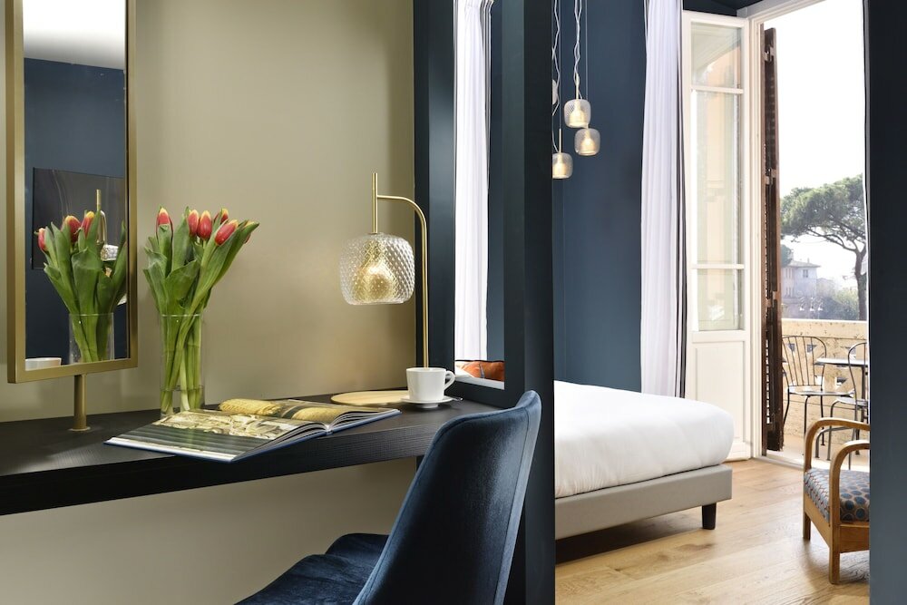 Фото Dimora ai Fori - Guesthouse