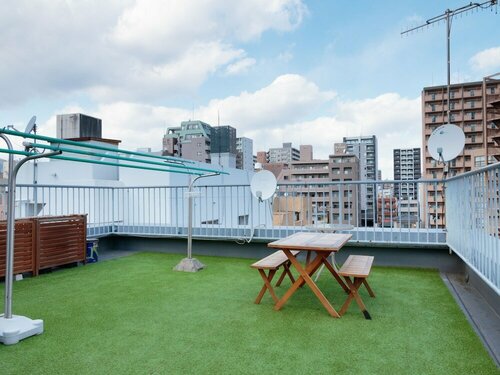 Внешний вид отеля J-Hoppers Hiroshima Guesthouse в Хиросиме, фото 5