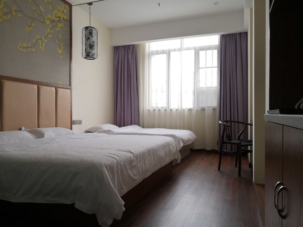 Фото Shanghai Linyin Holiday Hotel