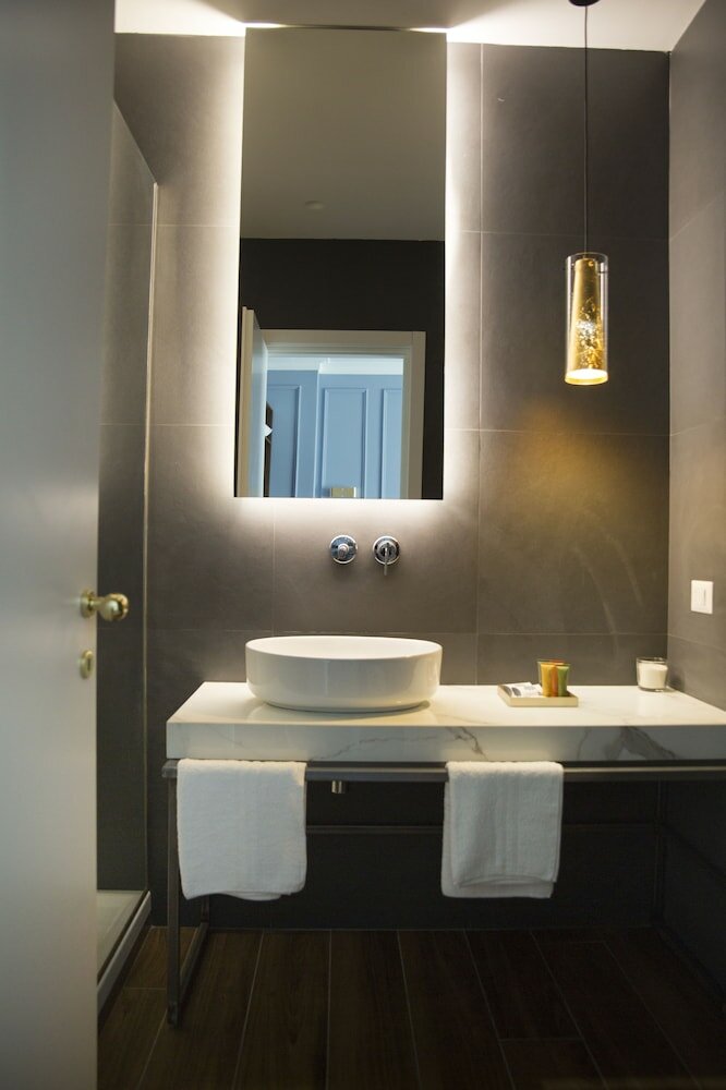 Фото Unicum Roma Suites