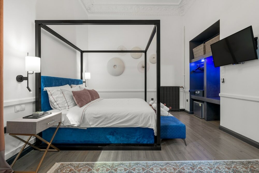 Фото 2 Mazi Suites