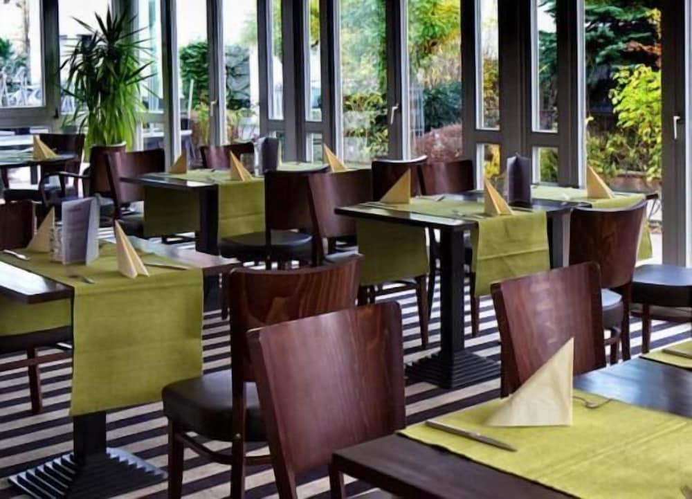 Фото Hotel Ambiente Walldorf