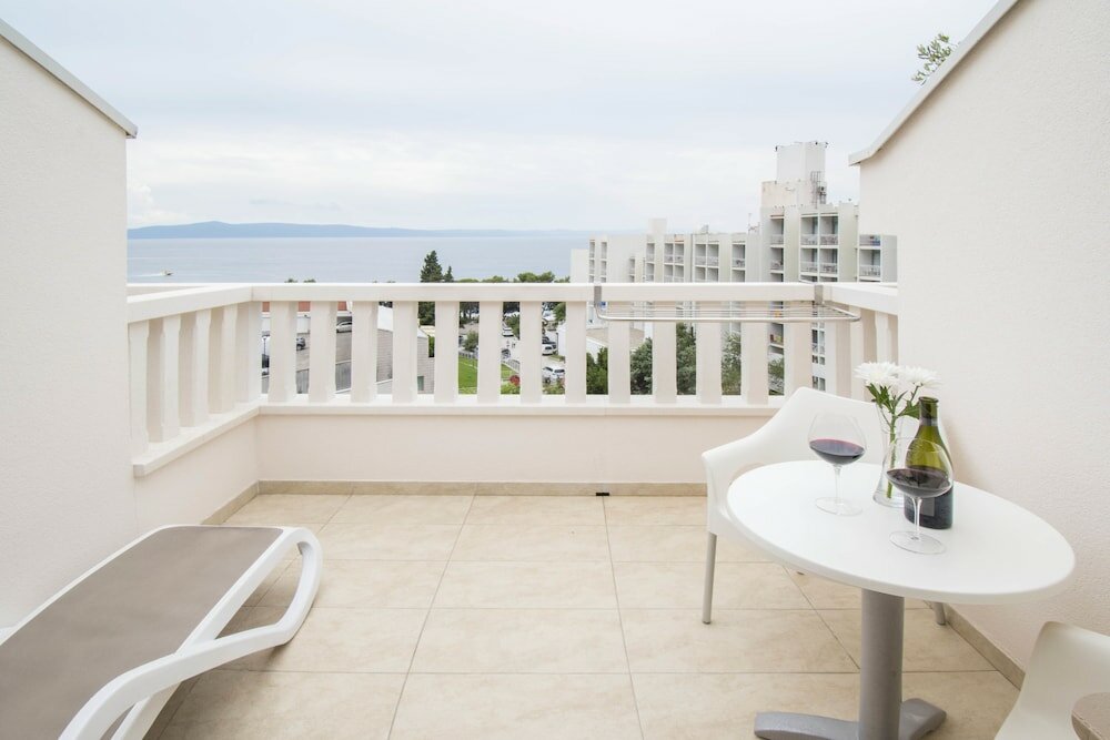 Фото Aparthotel Flora