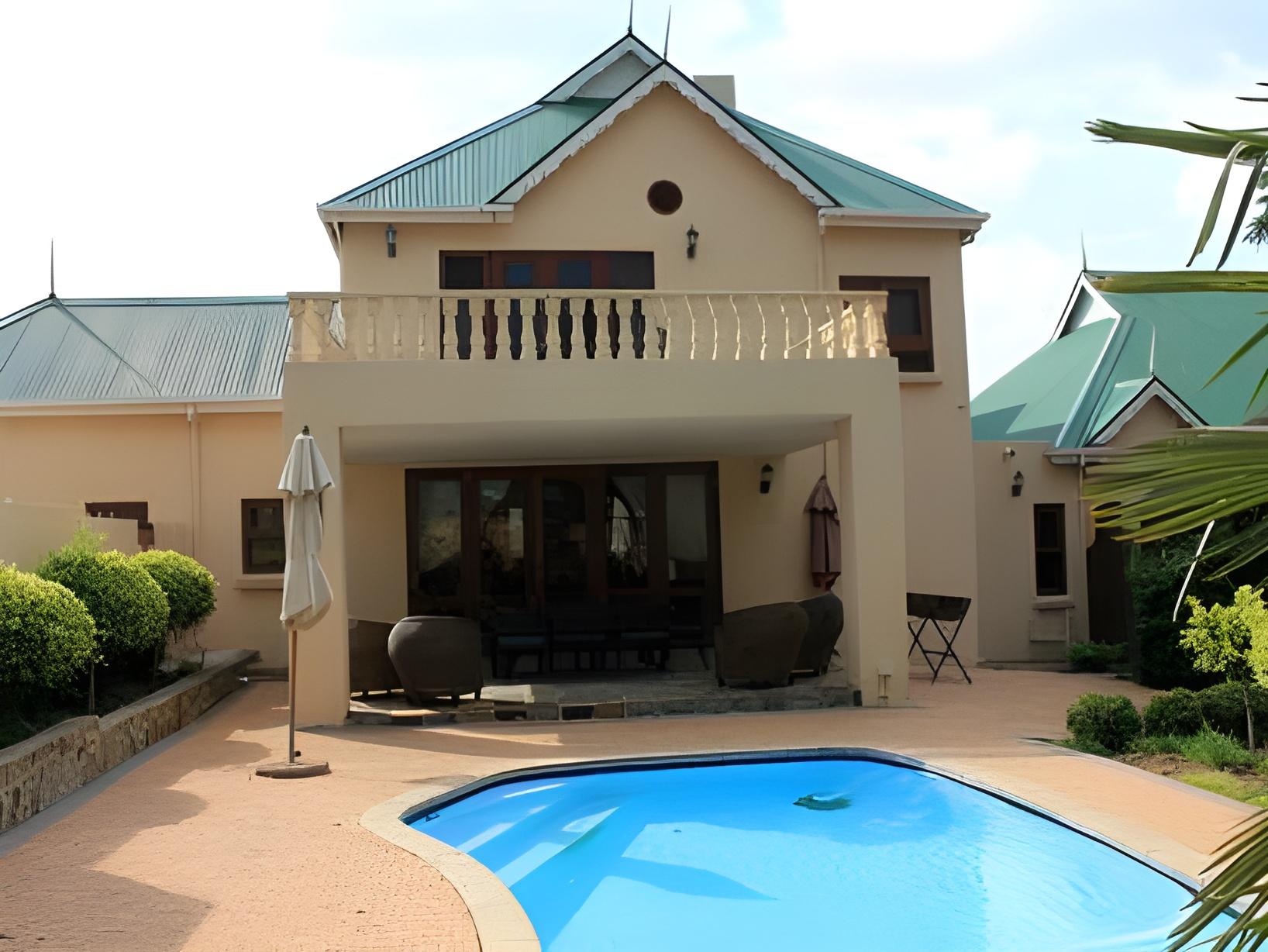 Фото Candlewoods Guesthouse