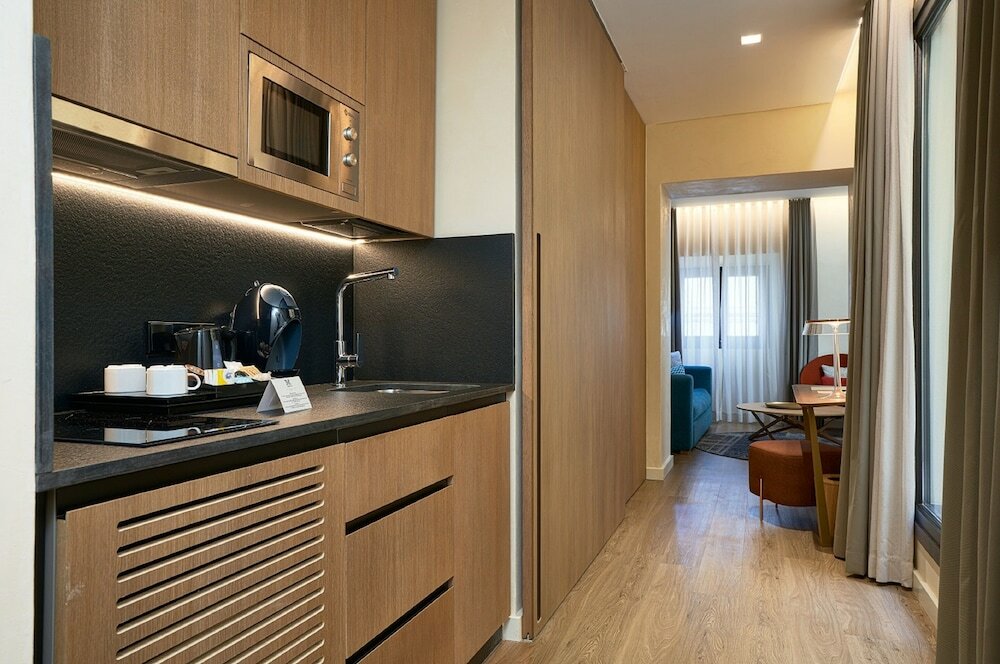 Фото Suites Murillo Plaza Sta Cruz