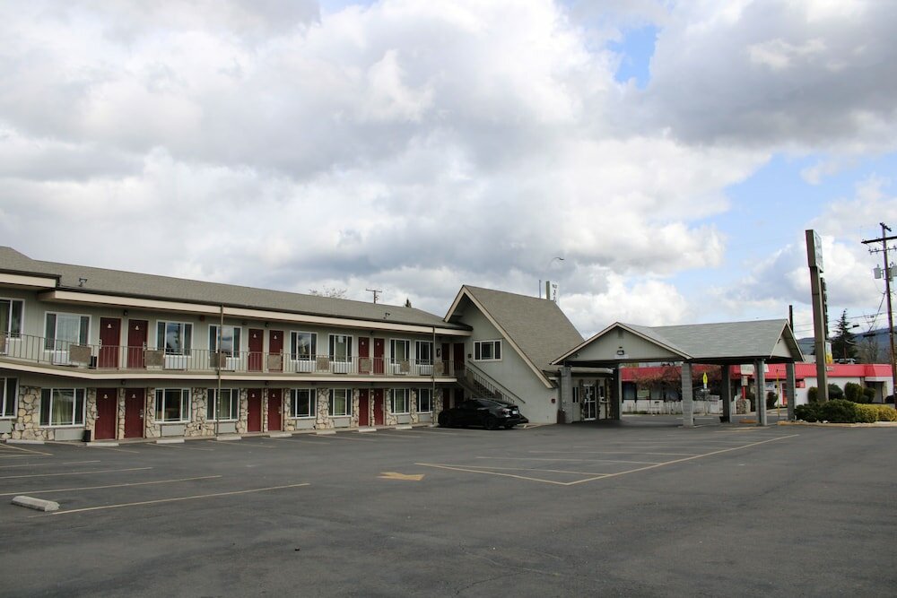 Фото Tiki Lodge Motel