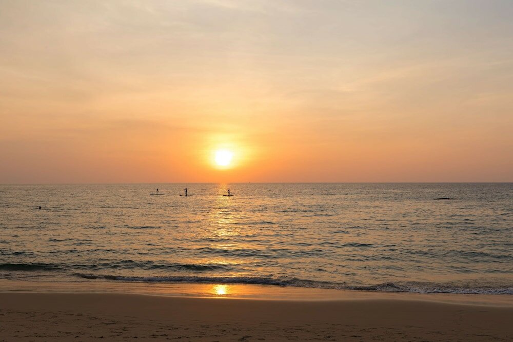 Фото Outrigger Surin Beach Resort