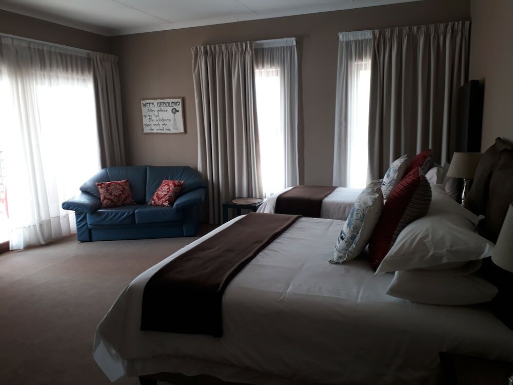 Фото Karoo Sun Boutique Guest House