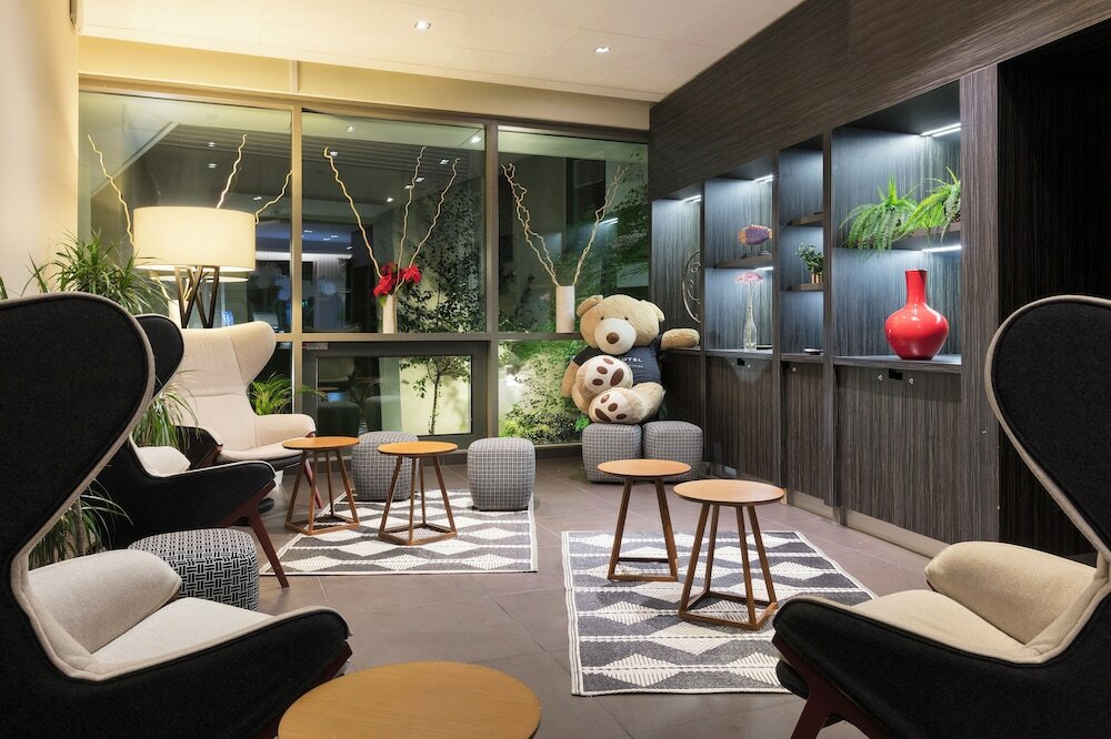 Фото Novotel Paris Saint Denis Stade Basilique