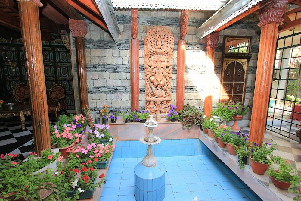 Фото WelcomHeritage Grace Hotel