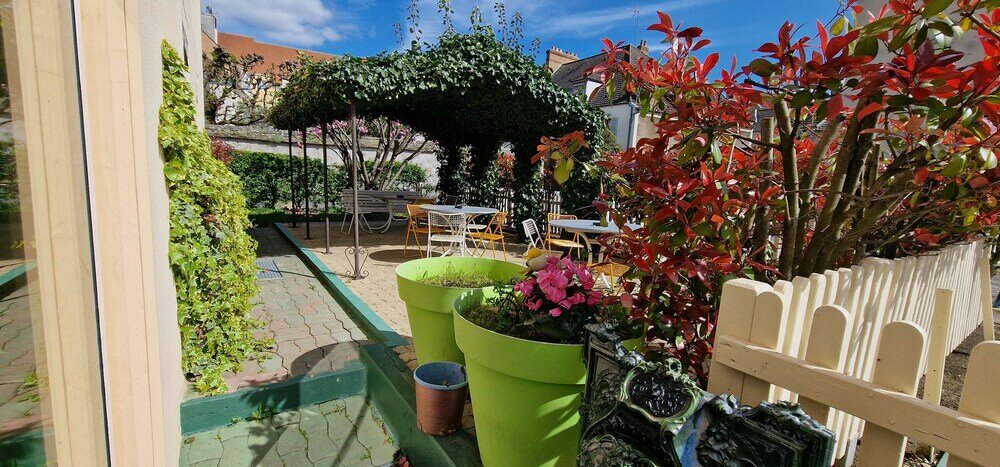 Фото Kyriad Direct Arpajon