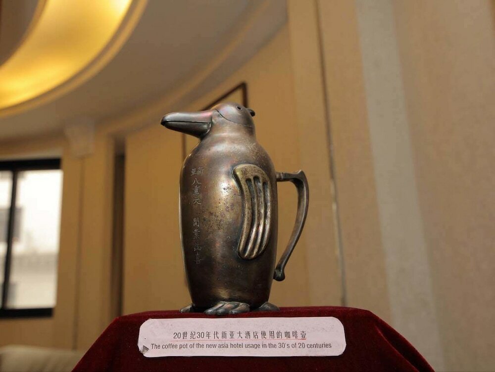 Фото New Asia Hotel