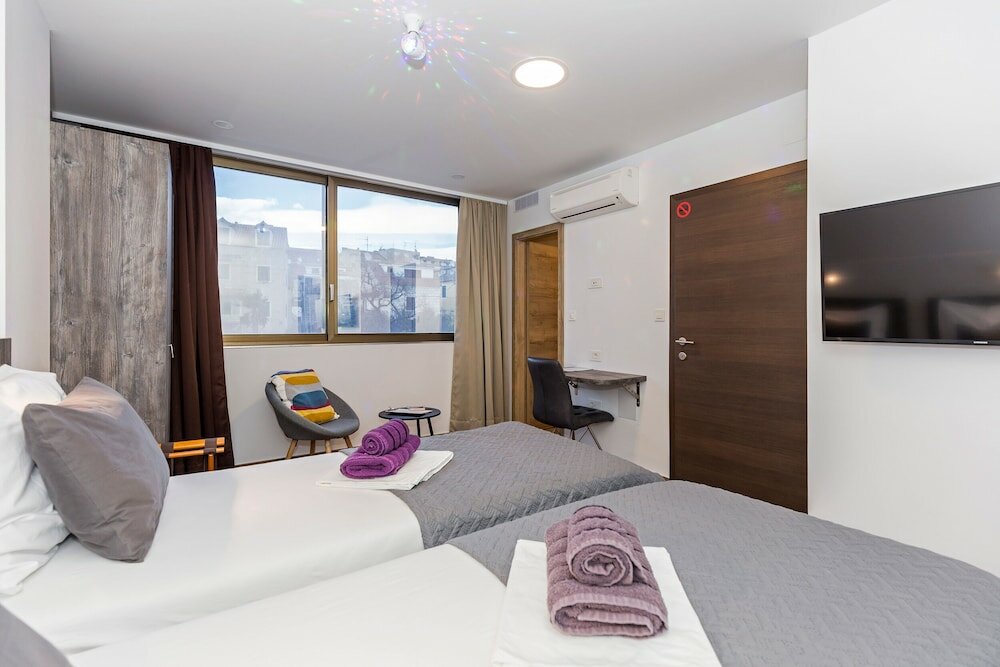 Фото Apinelo Tower Rooms