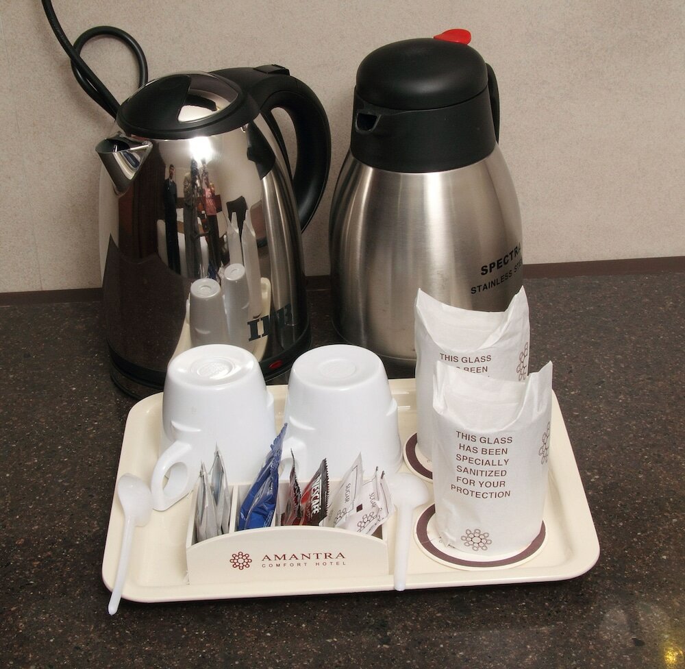 Фото Amantra Comfort Hotel