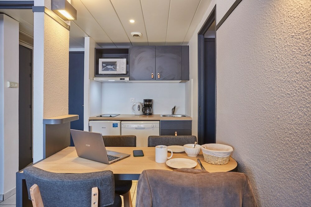 Фото Appart'hôtel Odalys City L'Atrium