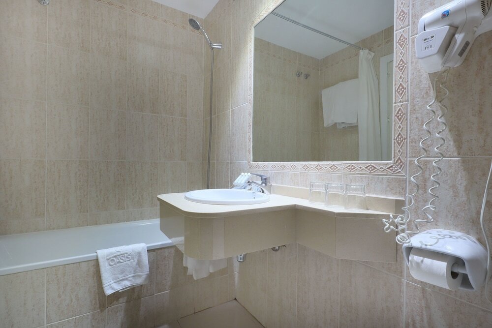 Фото Oasis Cordoba Hotel