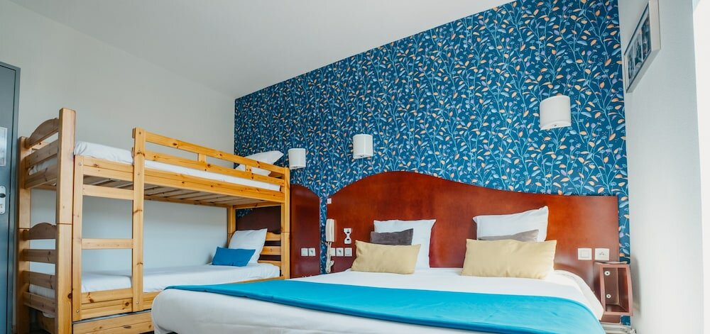 Фото Hôtel Les Commerçants