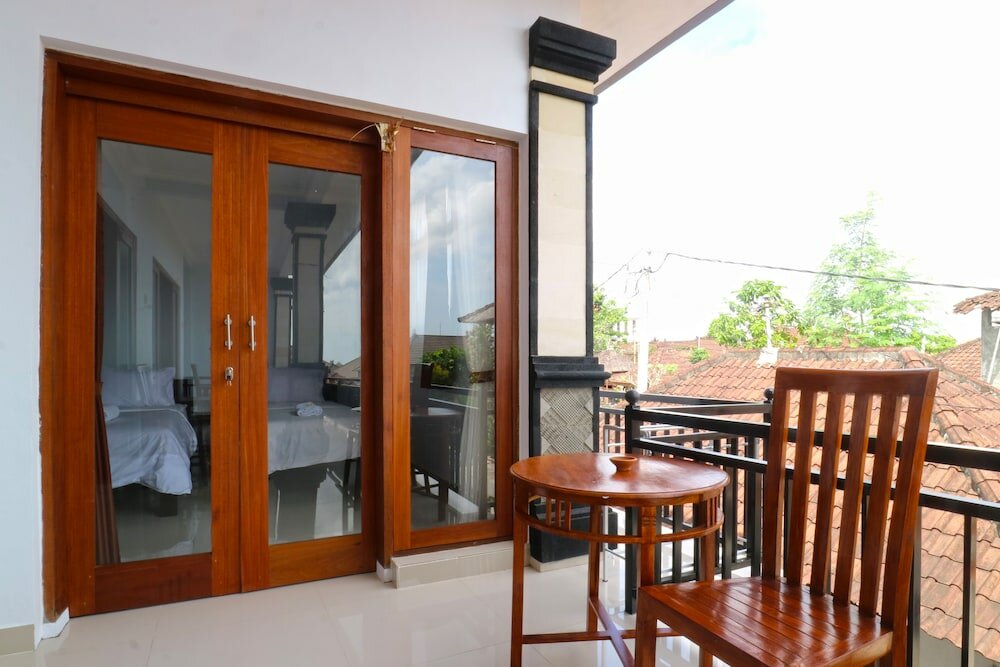 Фото The Wina Echo Beach Guesthouse