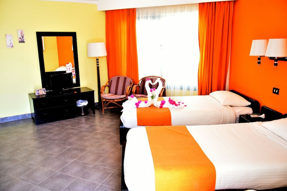 Фото Coral Garden Beach Resort